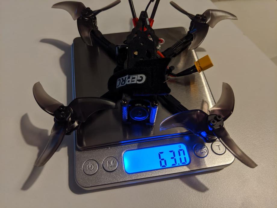 GEPRC Phantom on a scale weighing 63 grams without a battery