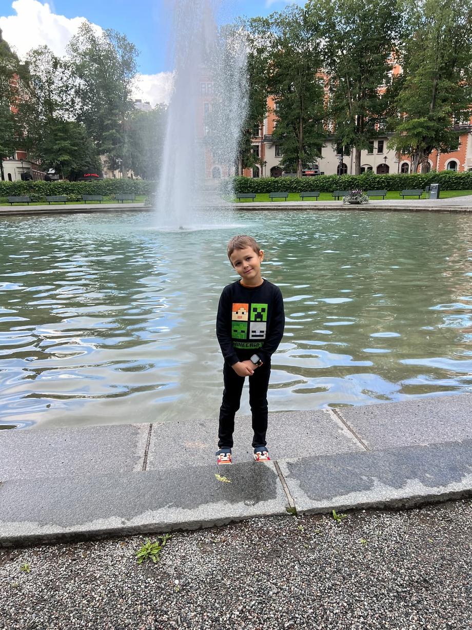 Anton at a fountain in Sweden