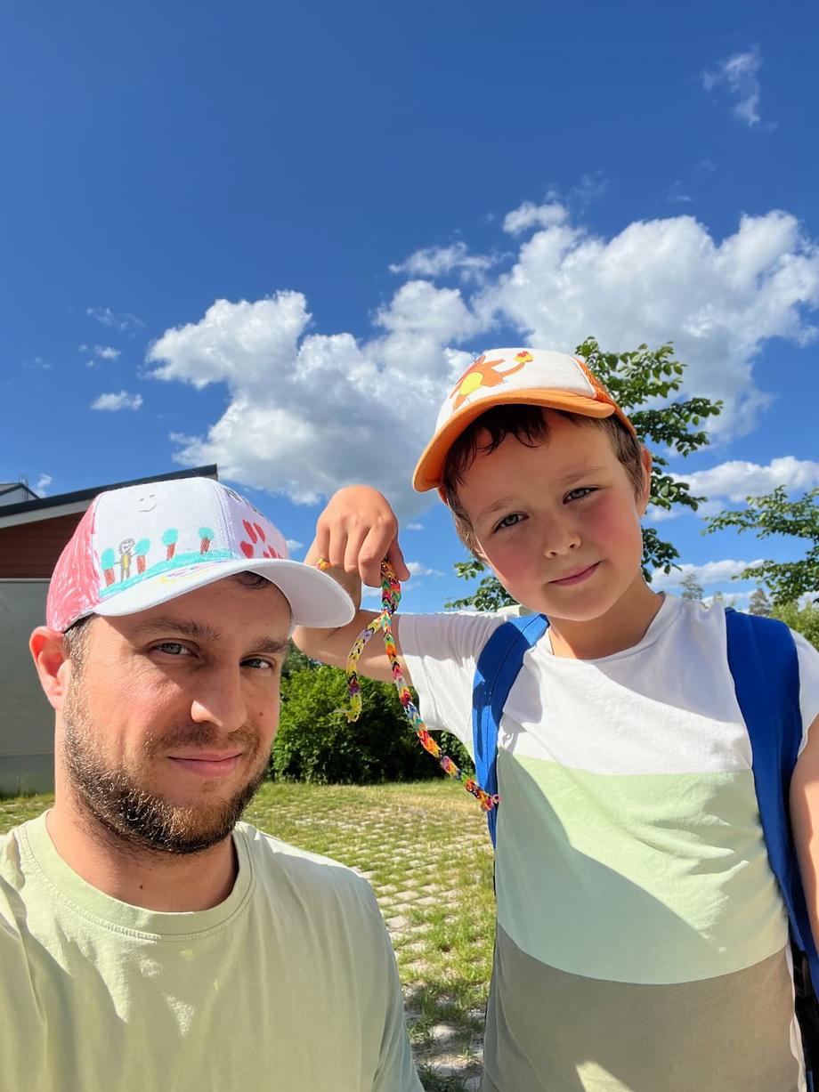 anton and dad with caps